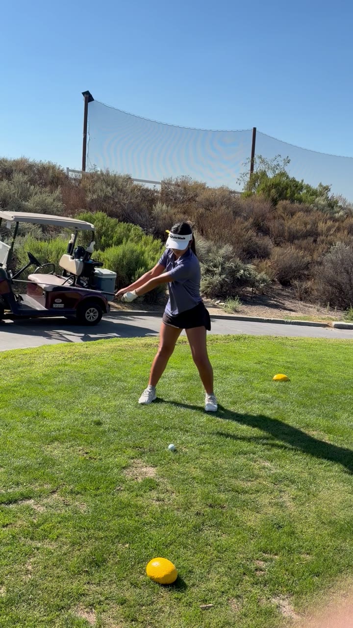 Leeanne hits a tee shot at Sand Canyon.