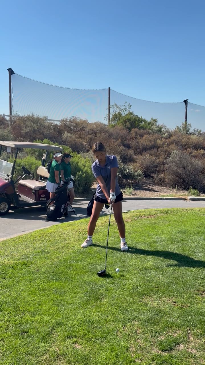 Claire with a tee shot at Sand Canyon.