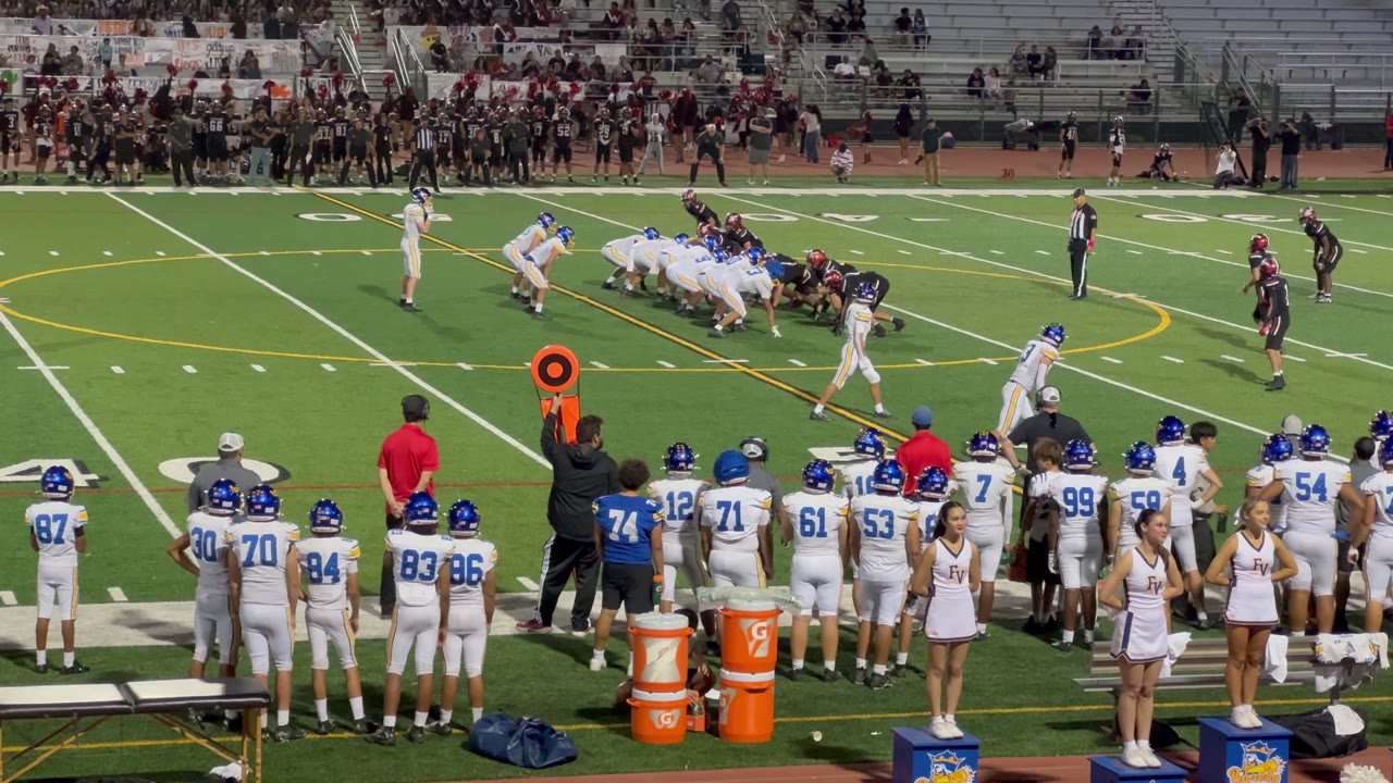 Wild cat play leads to a first down and an additional 15 yards in plen