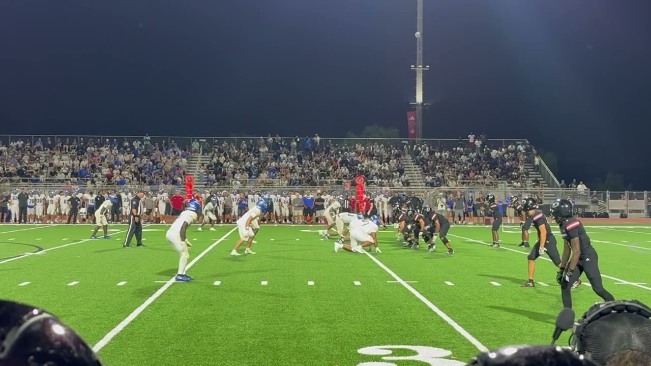 Jefferson getting chased by a tidal wave of defenders, fires a strike 