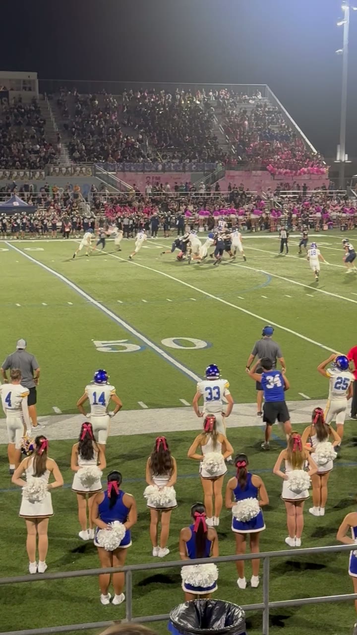 Scoring run by the QB with great blocks by the Offensive line and team