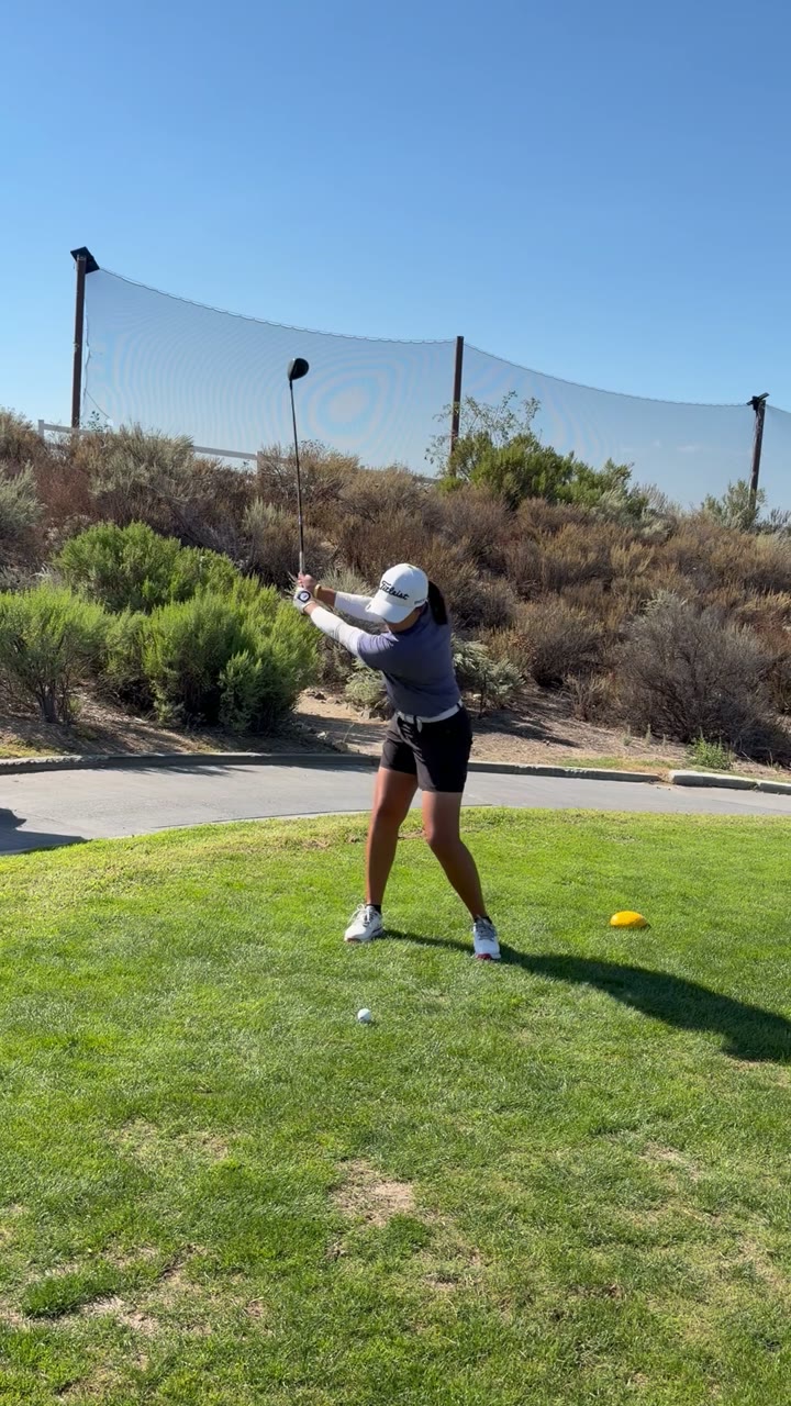 Kara with a tee shot at Sand Canyon.